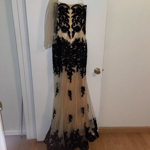 Elegant cream mermaids dress with beadwork and lace accents